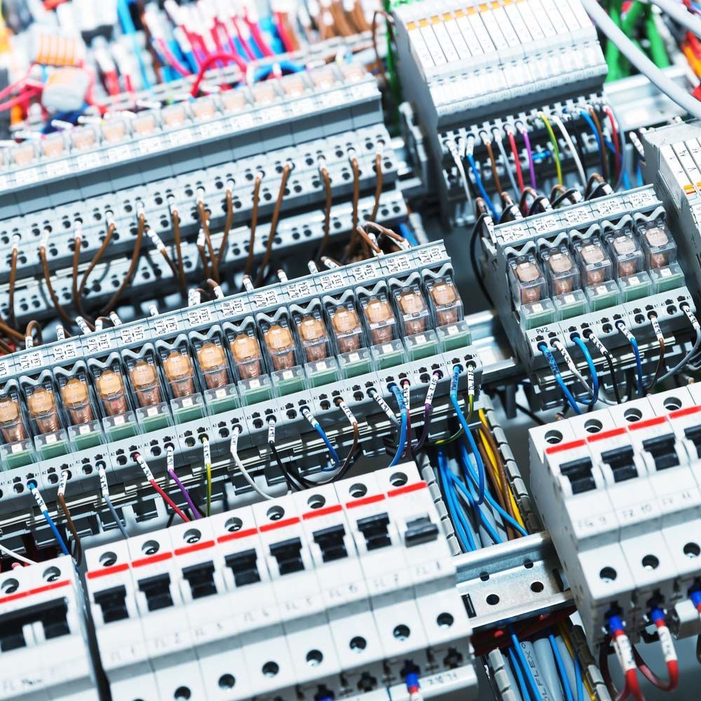 A Close up Of a Electrical Panel with Lots of Wires — A & J Electrical Contractors in Tamworth, NSW