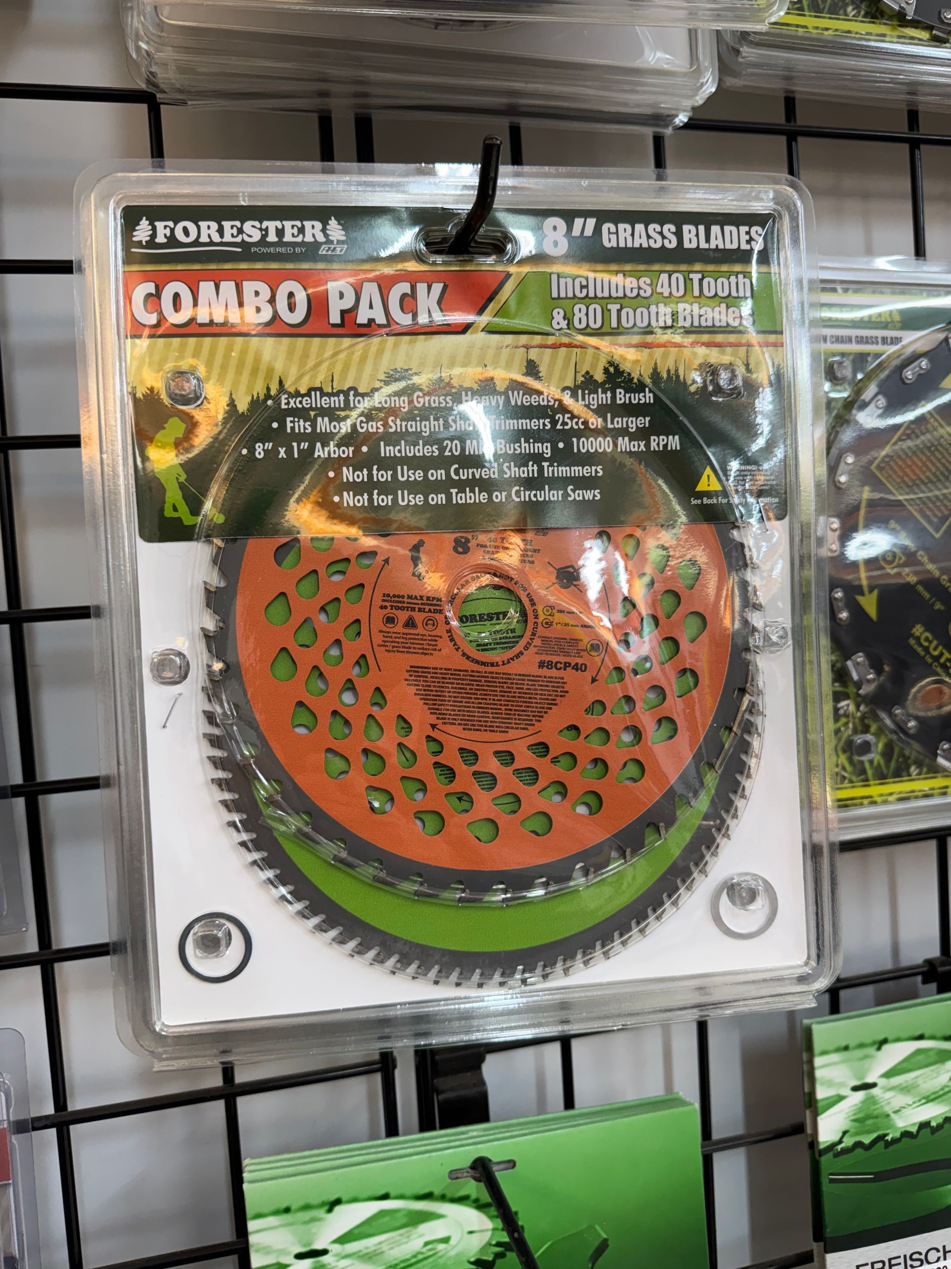 Combo pack of Forester grass blades on display. Blades are orange and green.