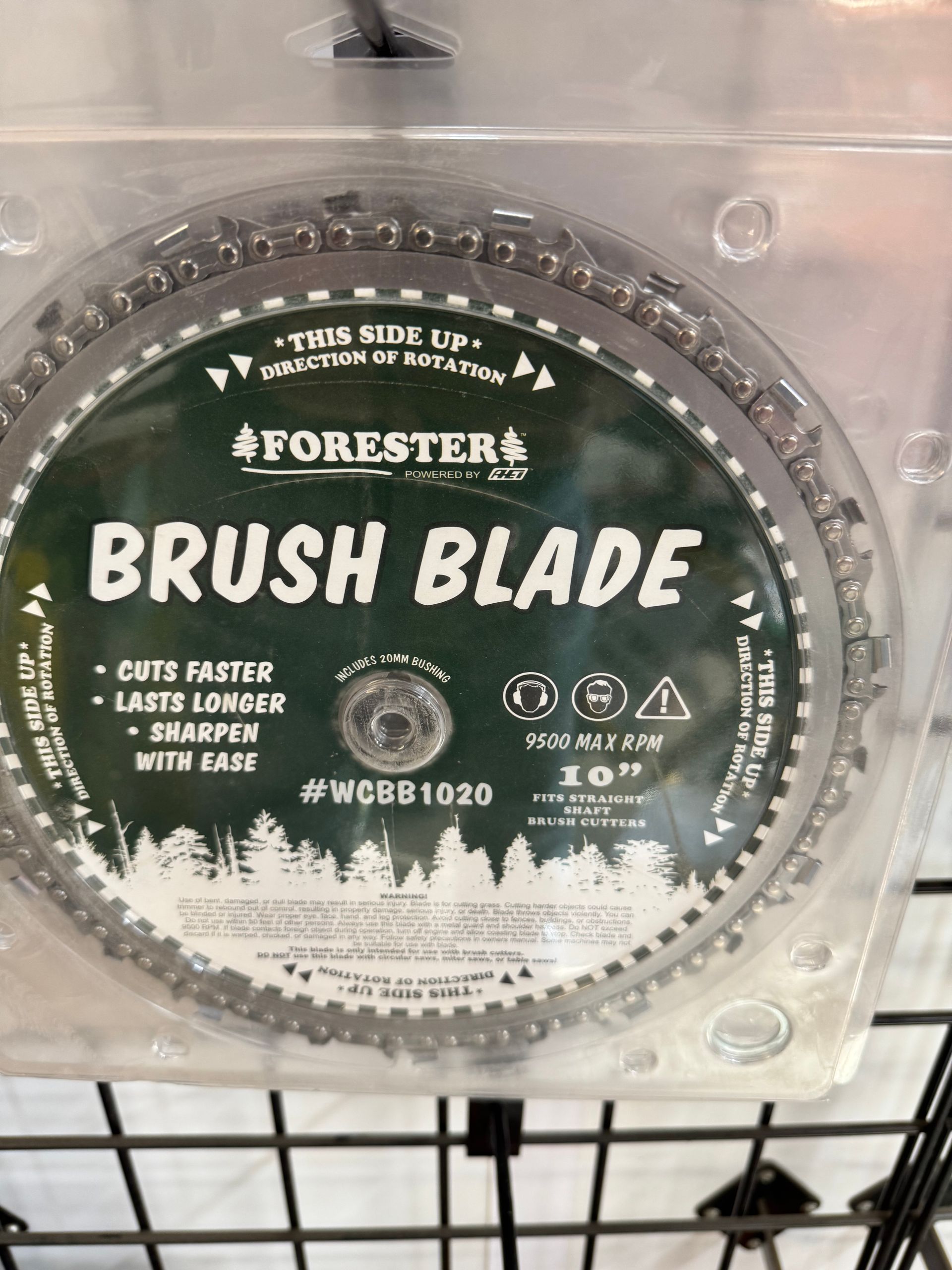 A circular Forester Brush Blade in a plastic package, with "This Side Up" and other text visible.