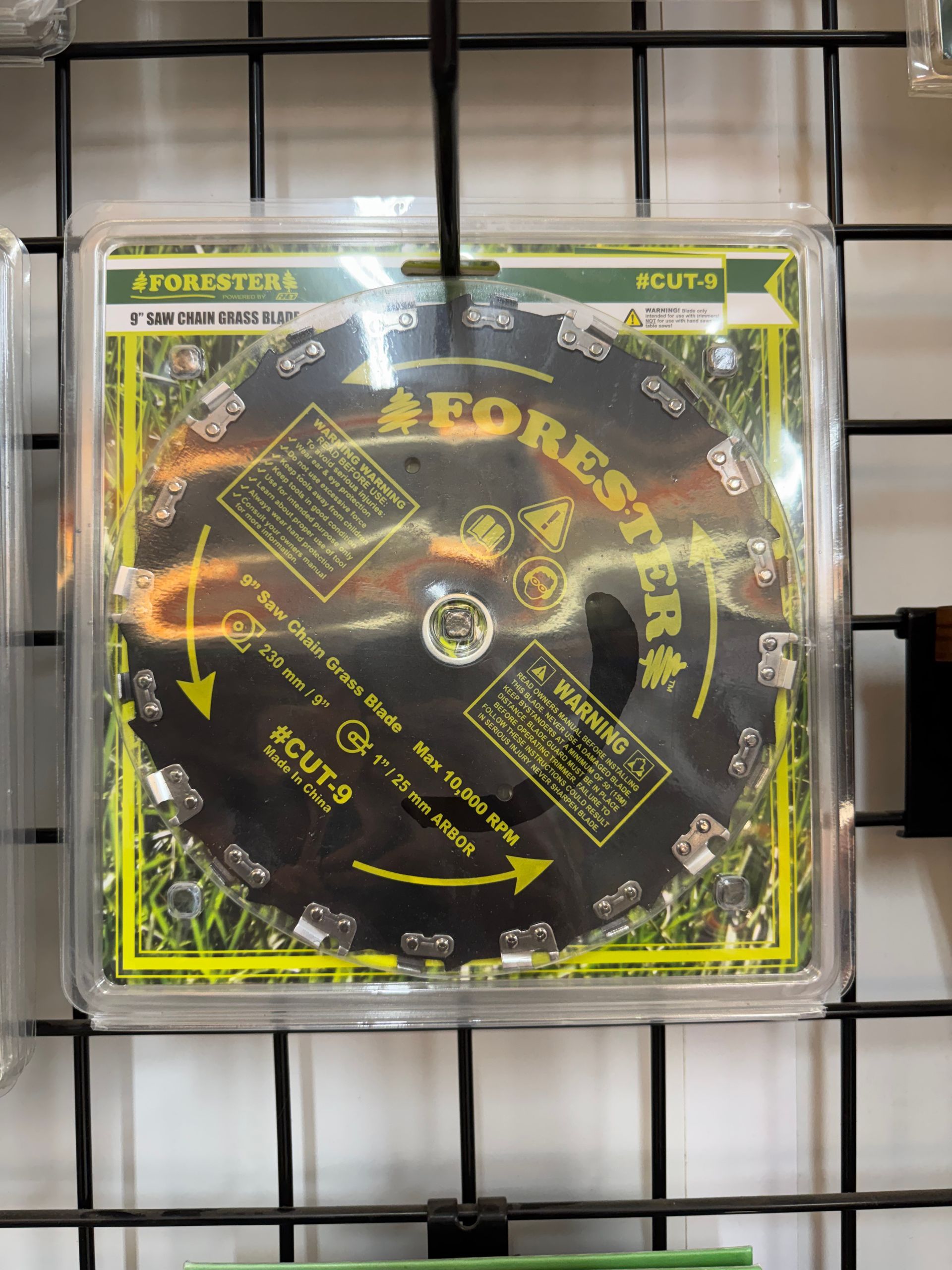 FORESTER brand circular saw blade in plastic packaging hanging on display.