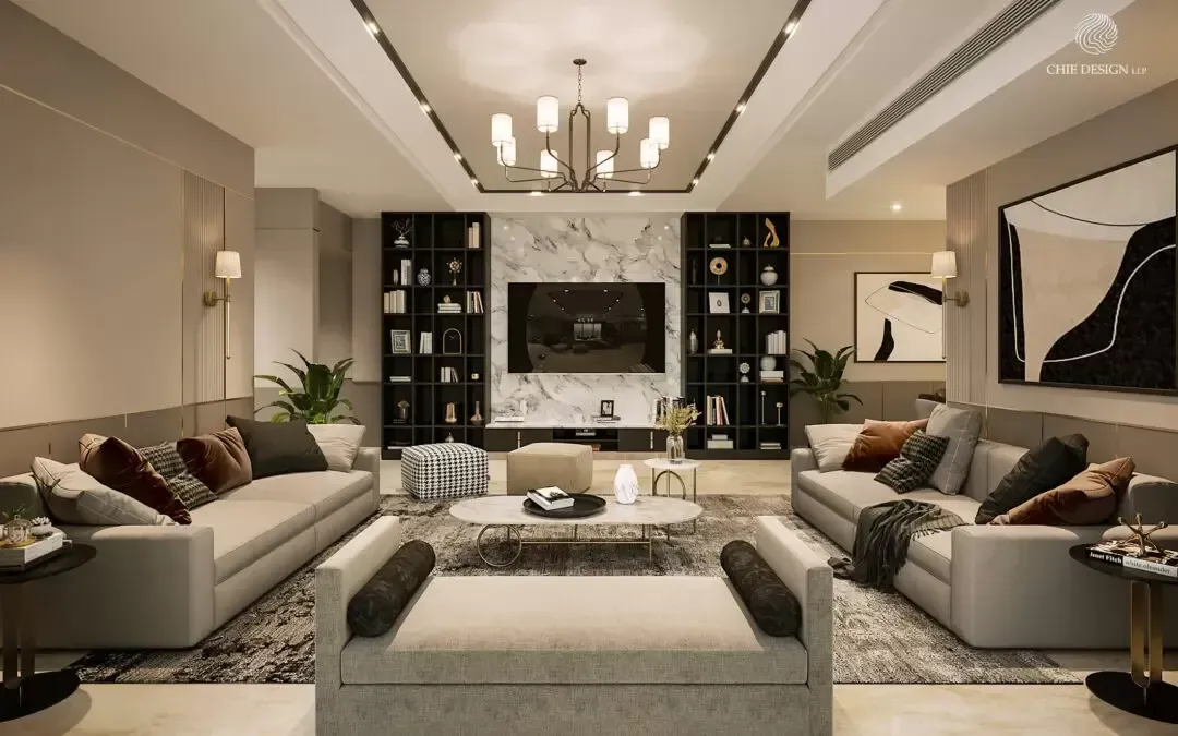 Luxurious living room with sofas, marble wall, bookshelves, and chandelier.