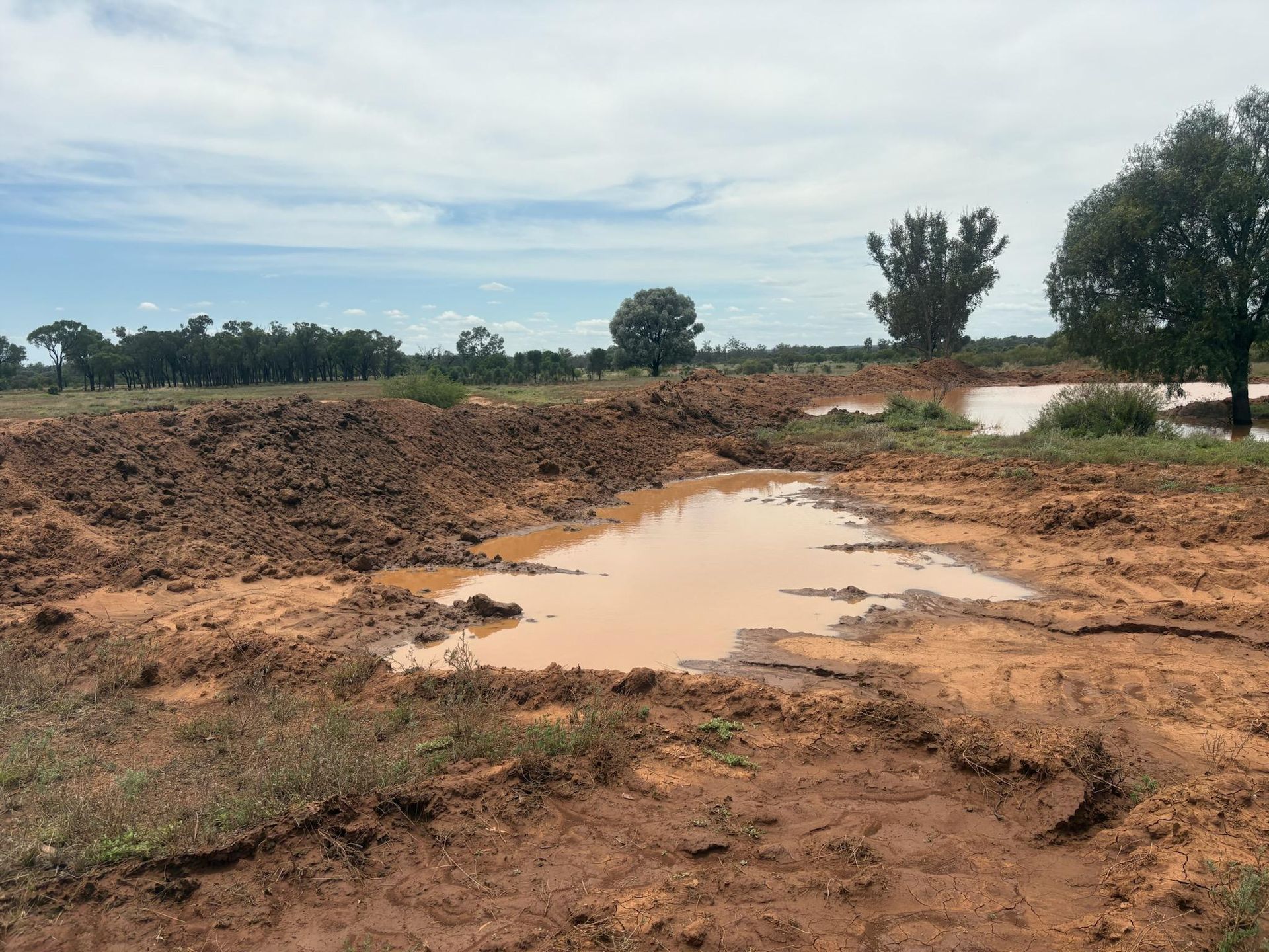 spreader banks red dirt erosion control