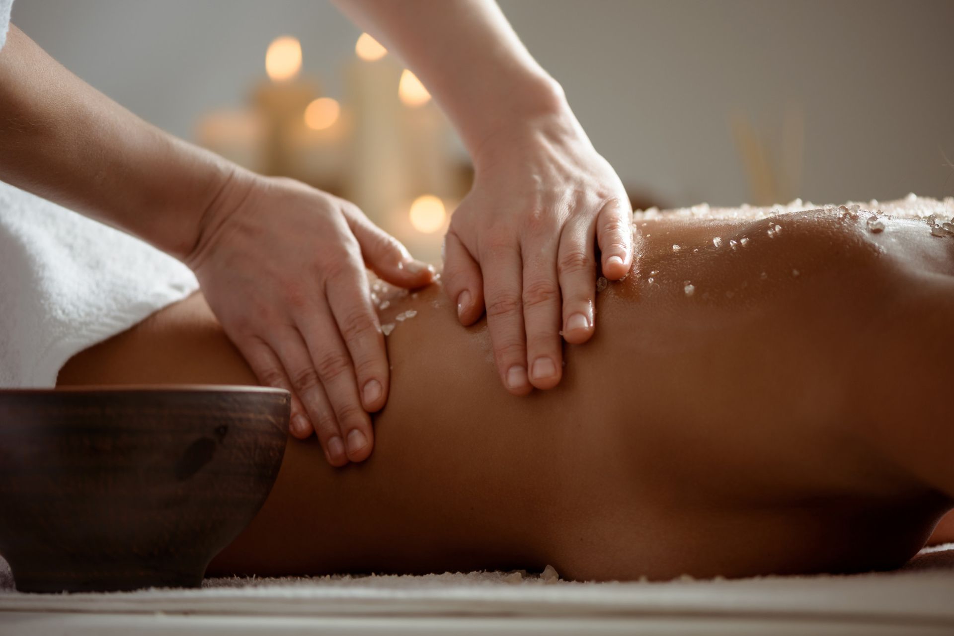 A woman is getting a massage at a spa.