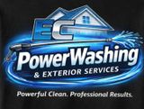 Logo for EC Power Washing & Exterior Services featuring a house silhouette, pine tree, and power washer spray in blue.