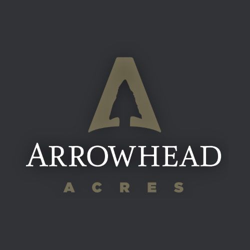 Logo for Arrowhead Acres: A brown arrowhead within a capital 