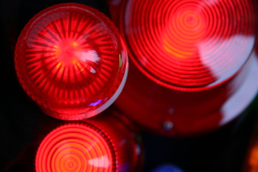 A Close Up of Three Red Lights on a Black Background — Jendata In Garbutt, QLD