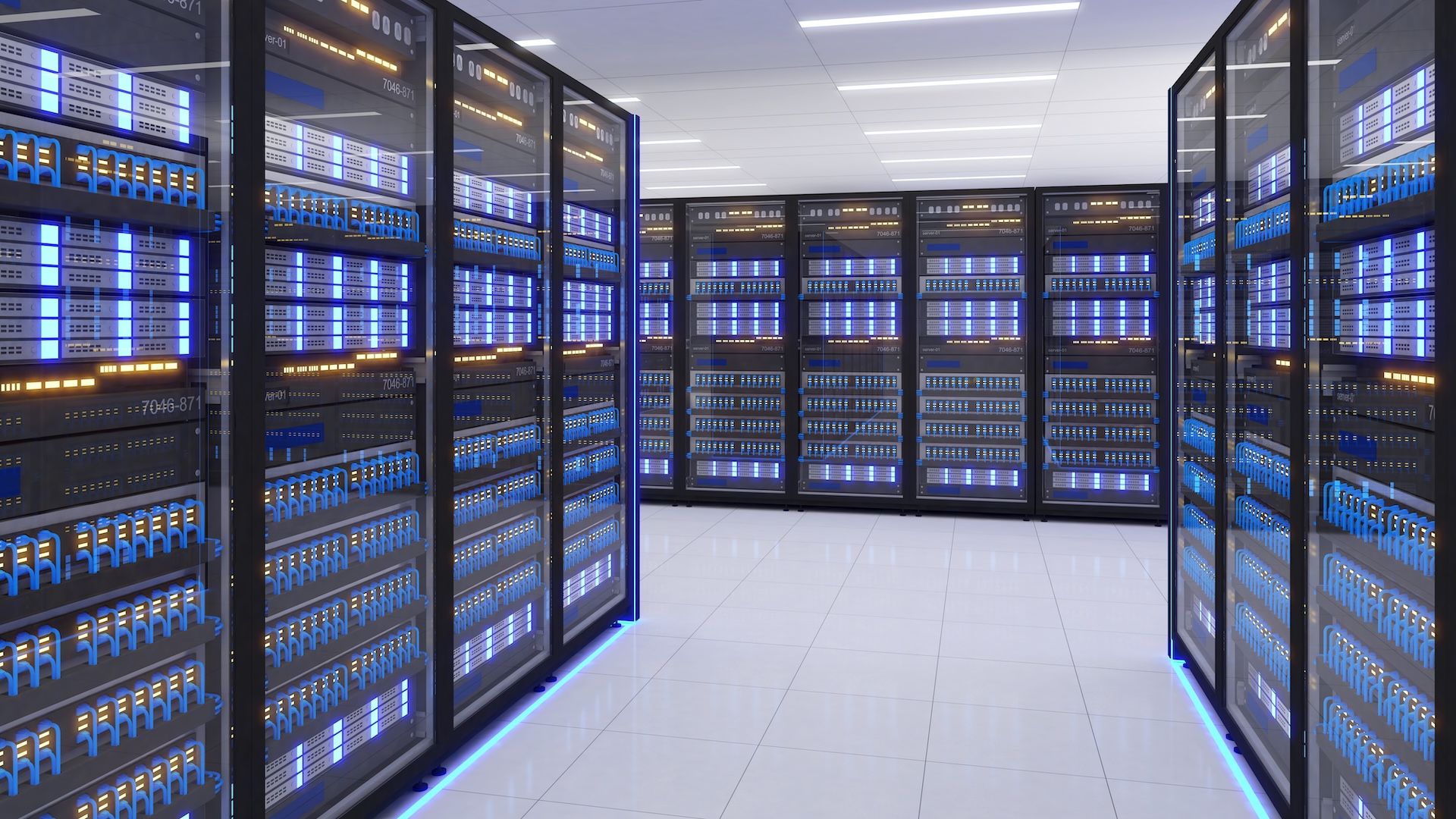 Rows Of Server Racks In A Brightly Lit Data Center, Emitting Blue And Orange Light — Jendata In Garbutt, QLD