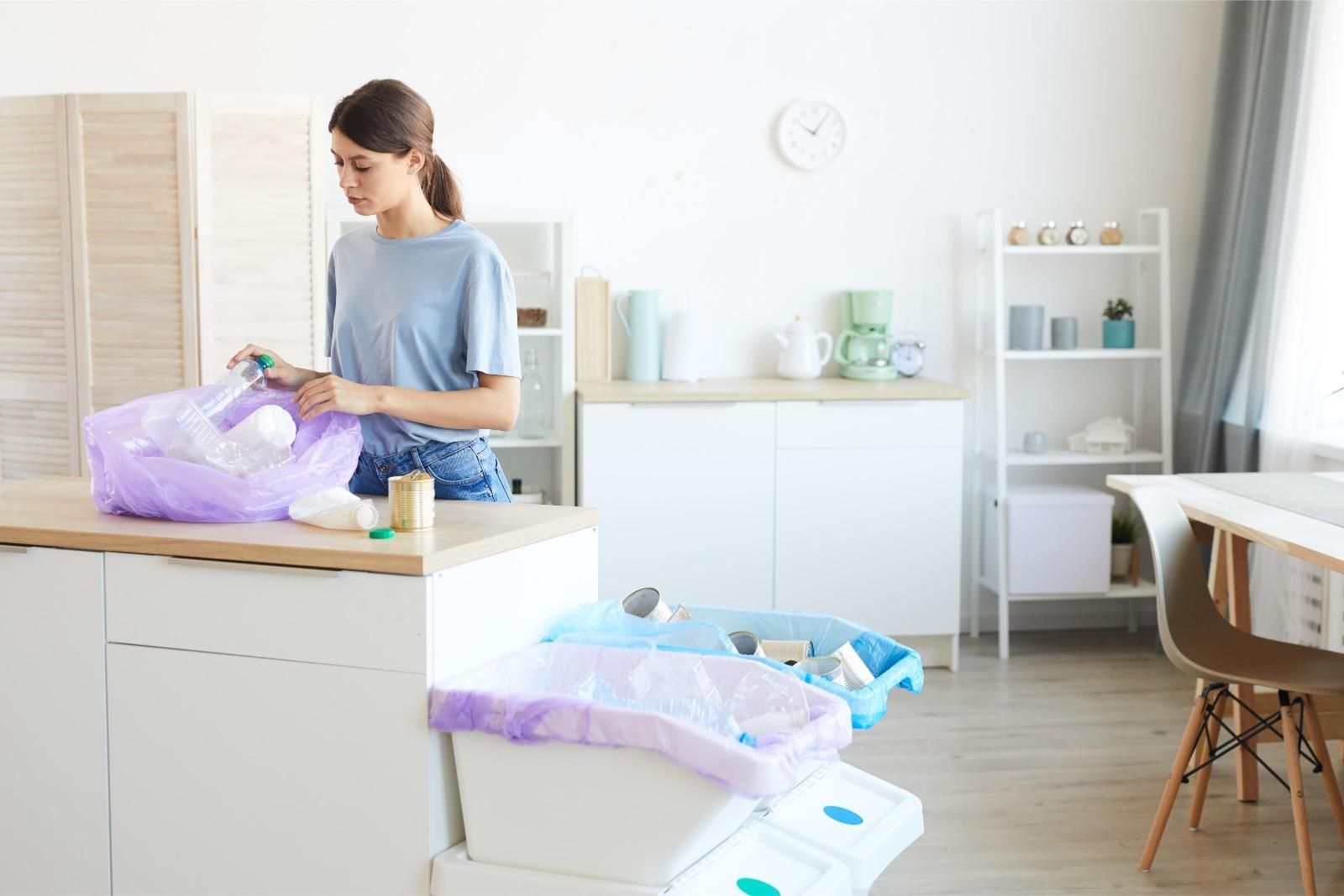 woman disposing of garbage