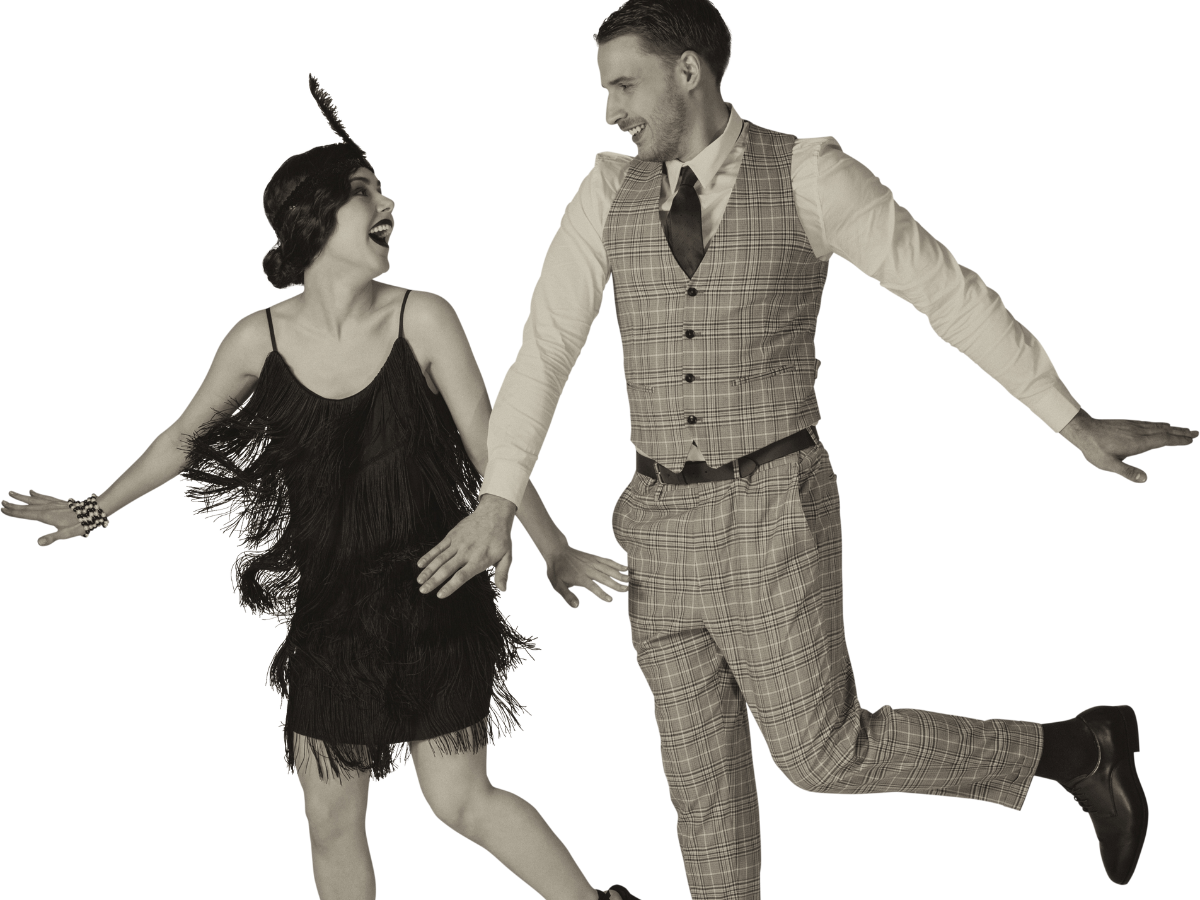 a large group of people are dancing on a dance floor at a party .