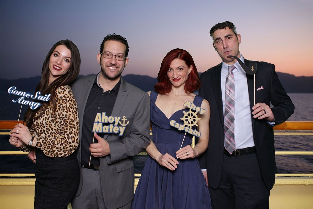 a group of people posing for a picture with one woman wearing a shirt that says ahoy matey