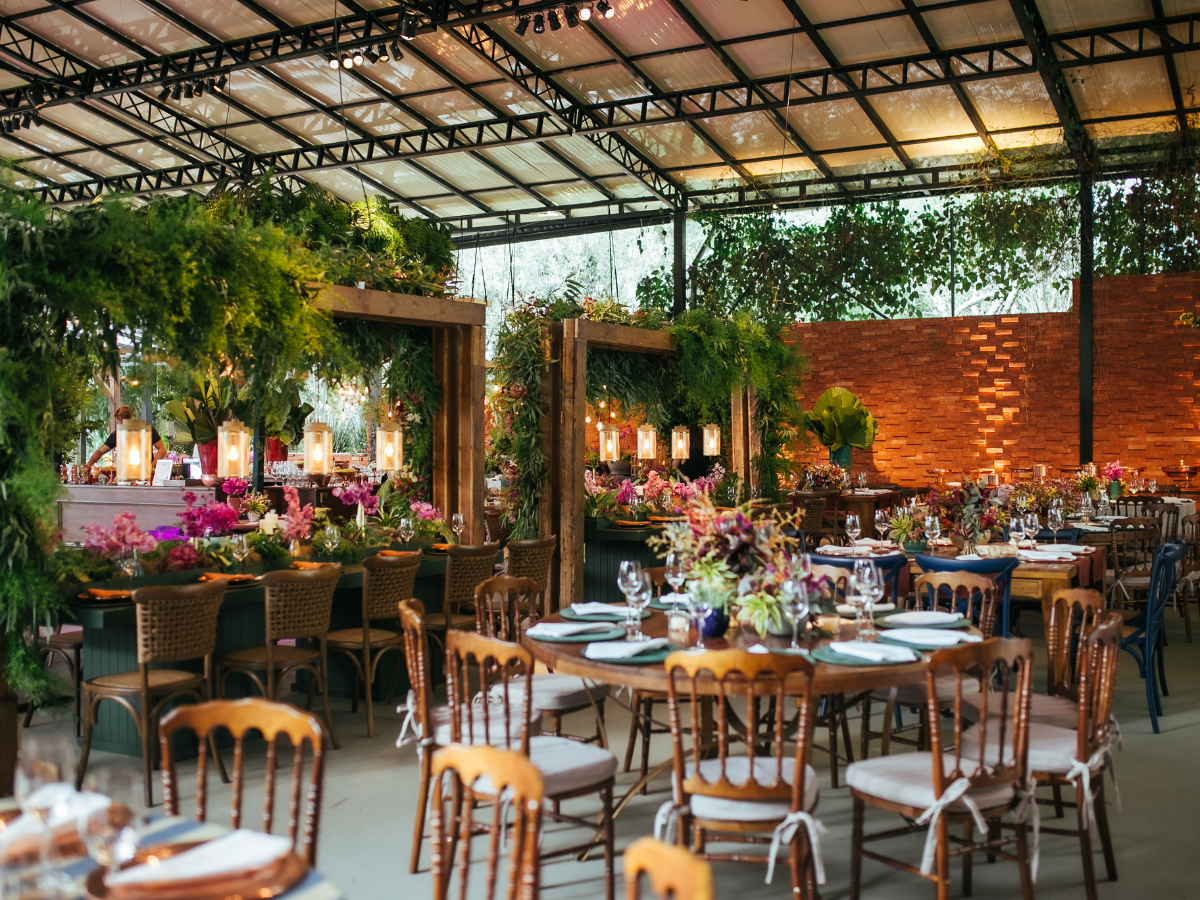 tables and chairs are set up for a wedding reception at a beautiful venue