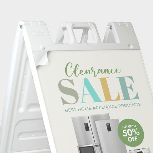 White sidewalk sign reading “Clearance SALE” and “Best Home Appliance Products,” with discount badge.