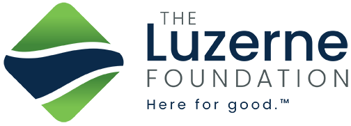 Logo for The Luzerne Foundation: diamond shape with green gradient, blue wave, and text