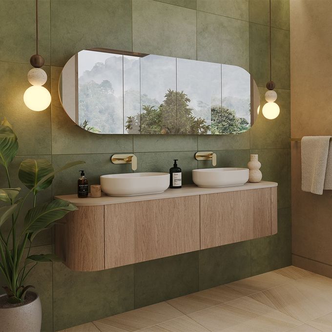 Modern bathroom with white bathtub, dark gray tiled wall, shower fixtures, and a wall-mounted mirror cabinet Modern bathroom with white bathtub, dark gray tiled wall, shower fixtures, and a wall-mounted mirror cabinet