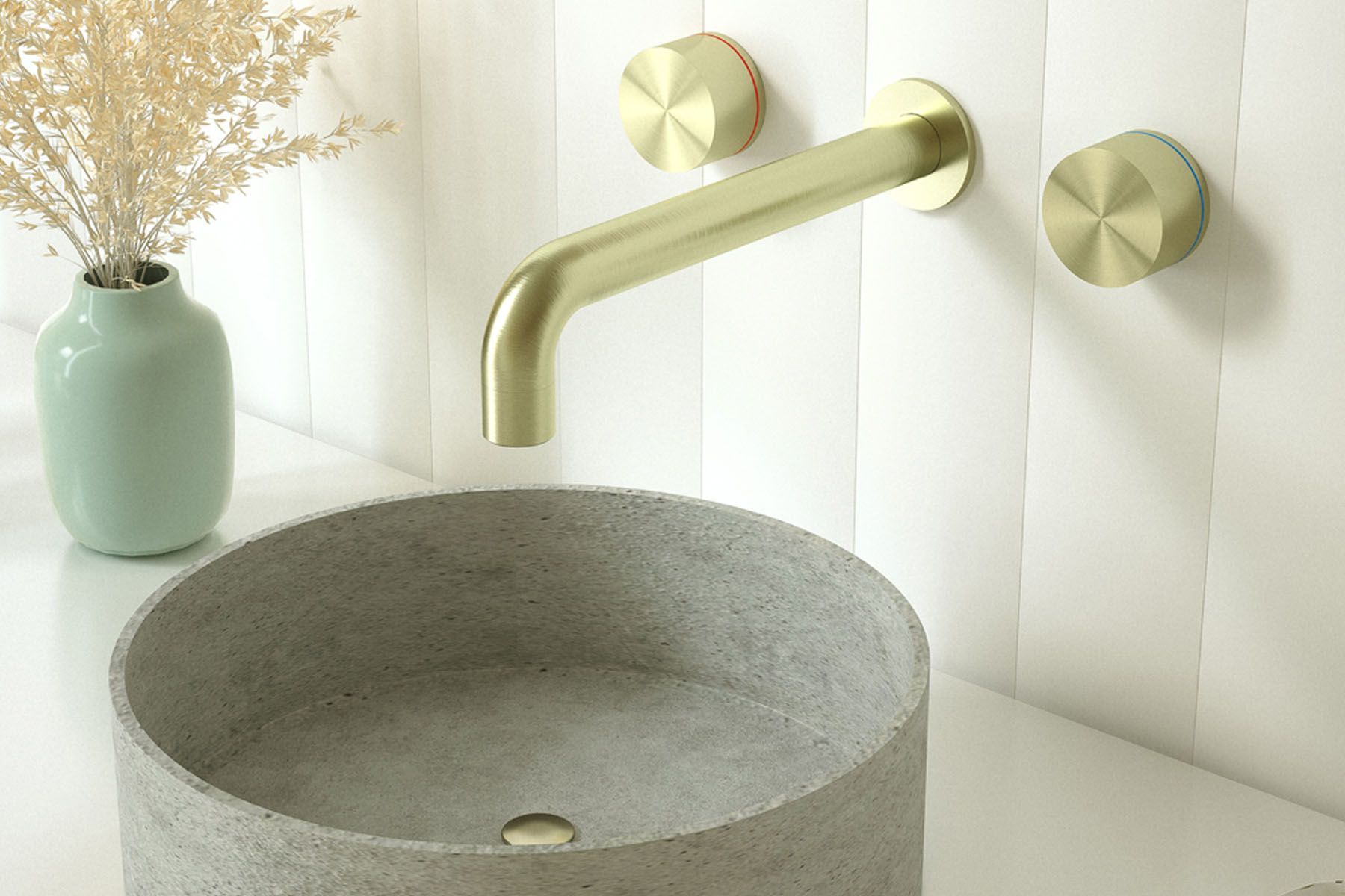Modern bathroom sink with gold faucet, gray basin, and a mint vase with dried flowers
