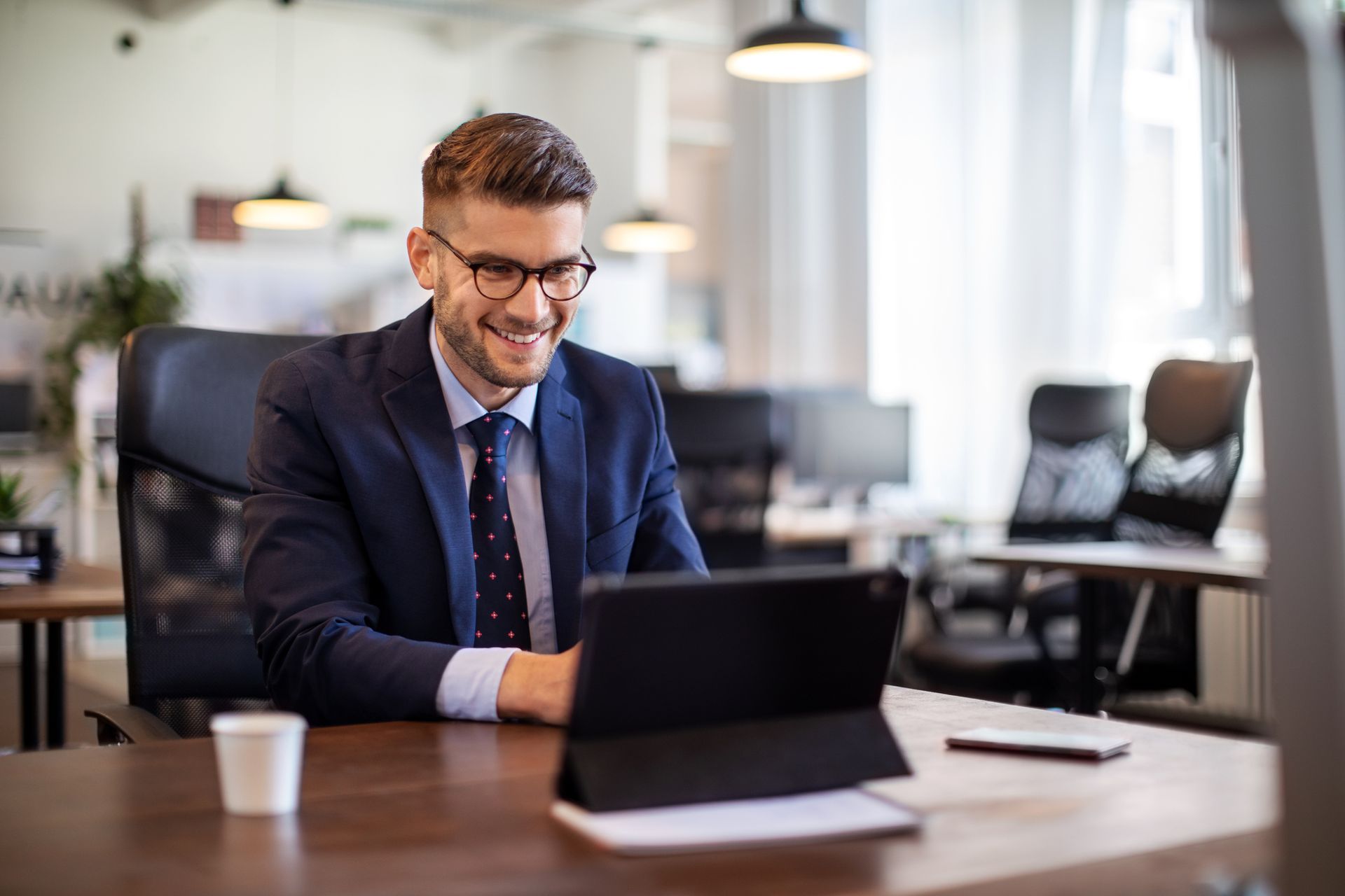 Business Man Using a Laptop - W. Palm Beach, FL - Accord Mediation, LLC