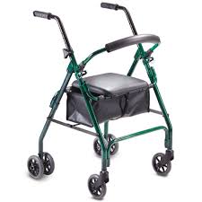 Green folding walker with seat, black handles, and four small wheels on a white background