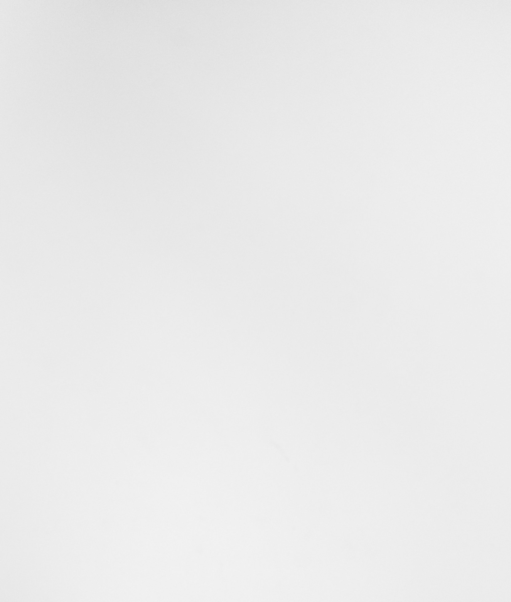 A close up of a white paper texture.