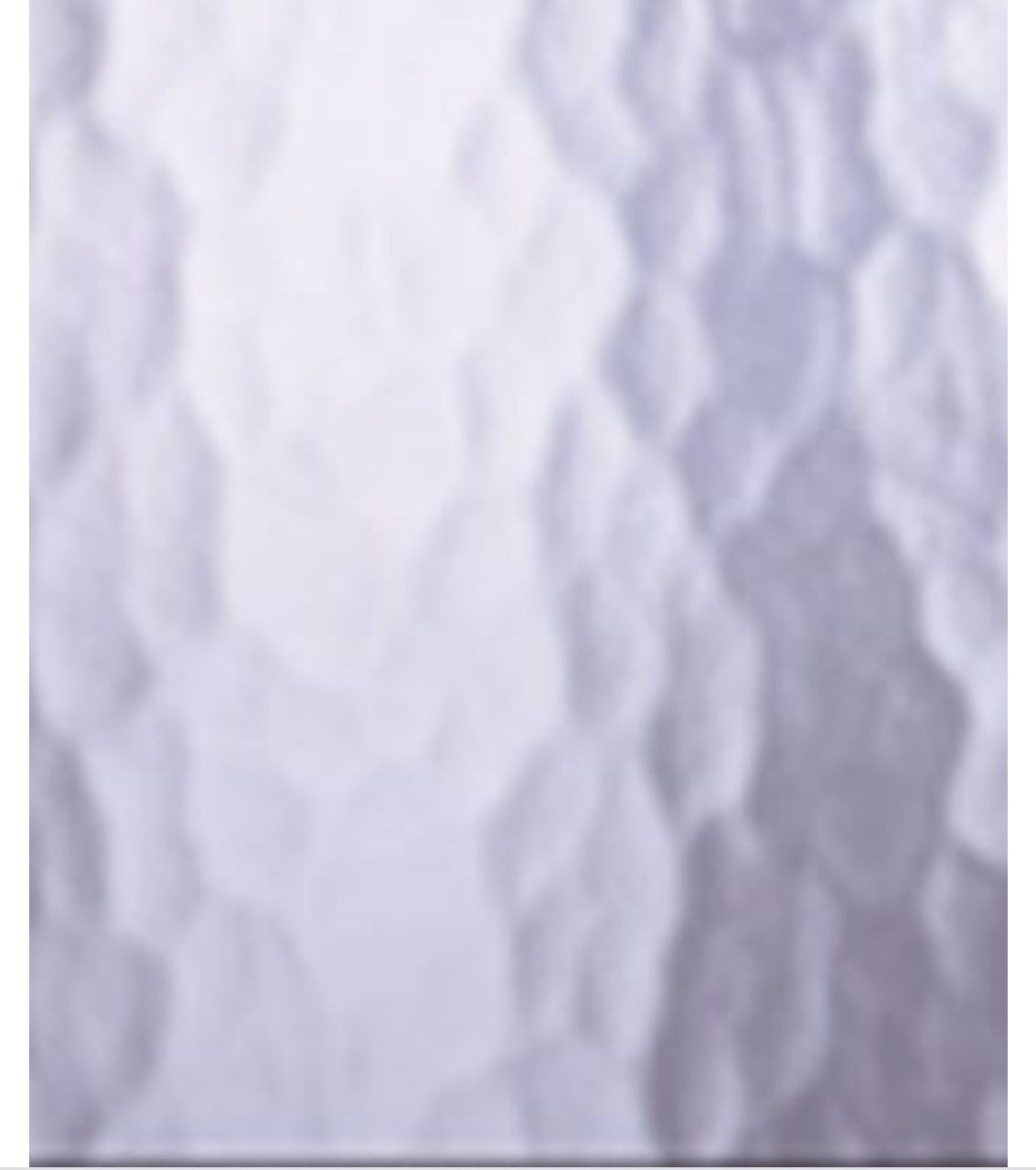 Crumpled pale lavender paper texture with soft vertical folds