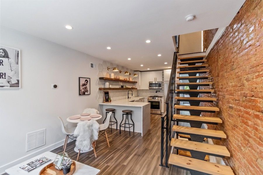 Rehabbed House with Modern Staircase and remodeled kitchen