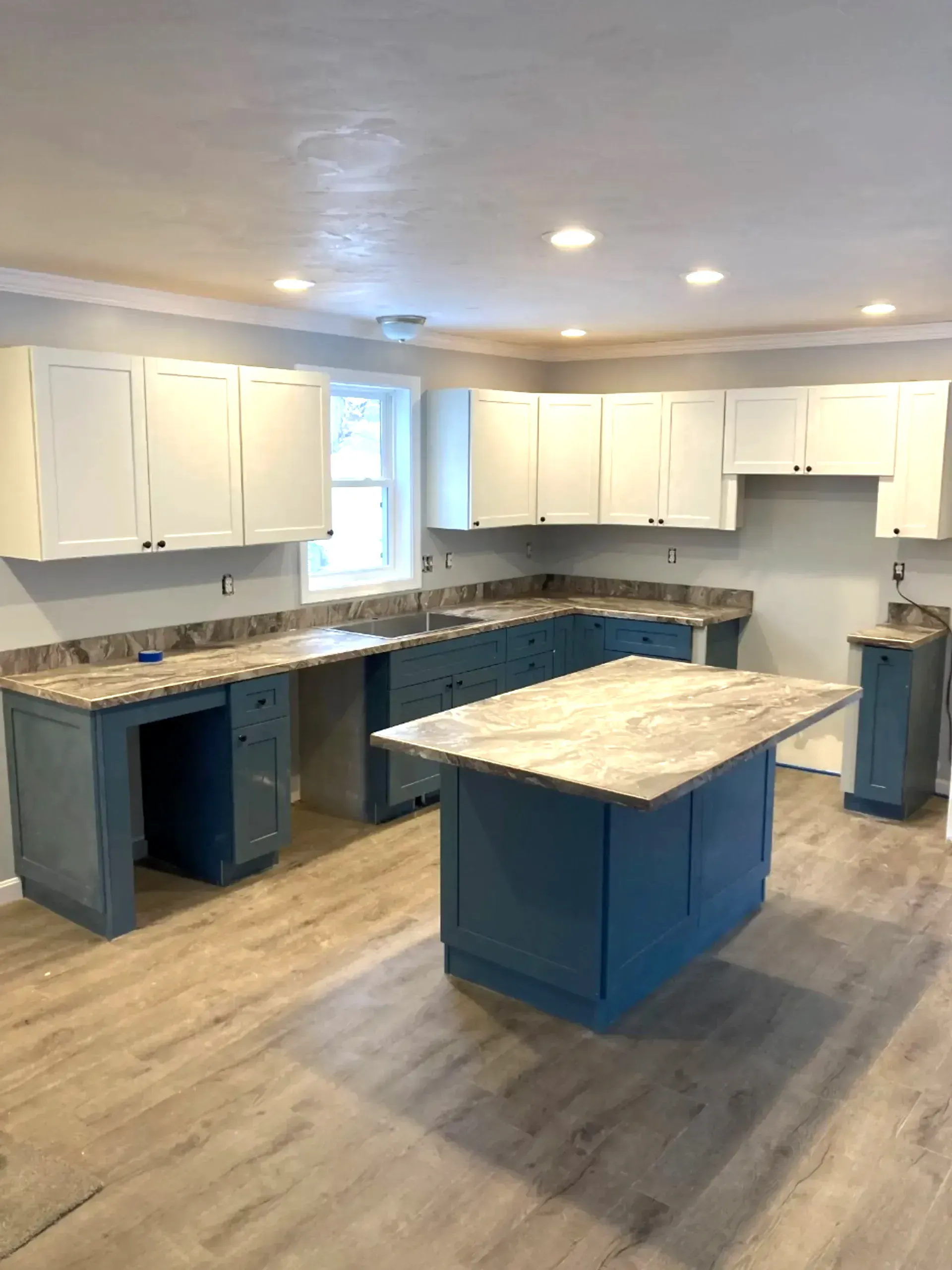 finished kitchen with island in the middle