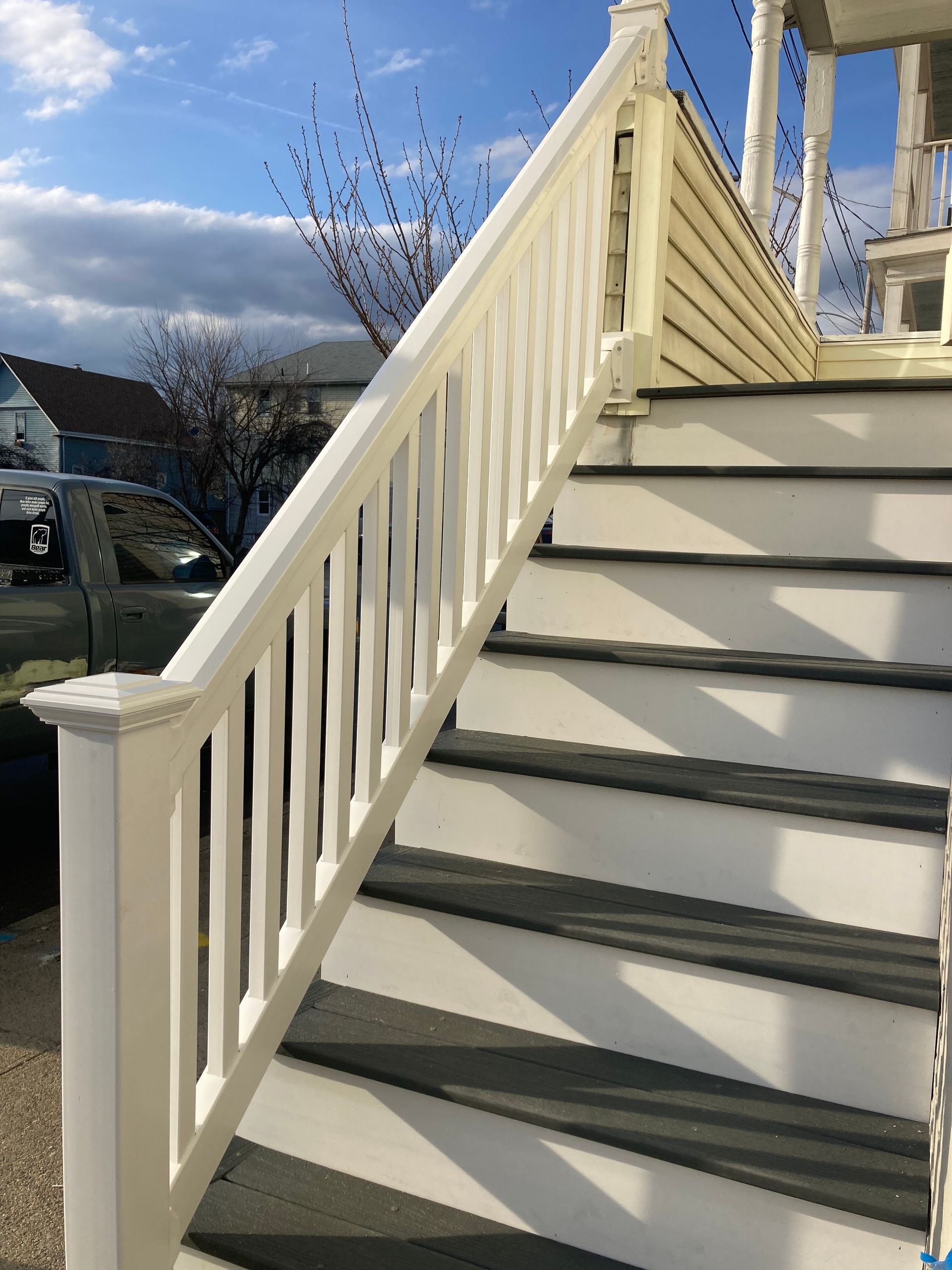 white and grey outside staircase