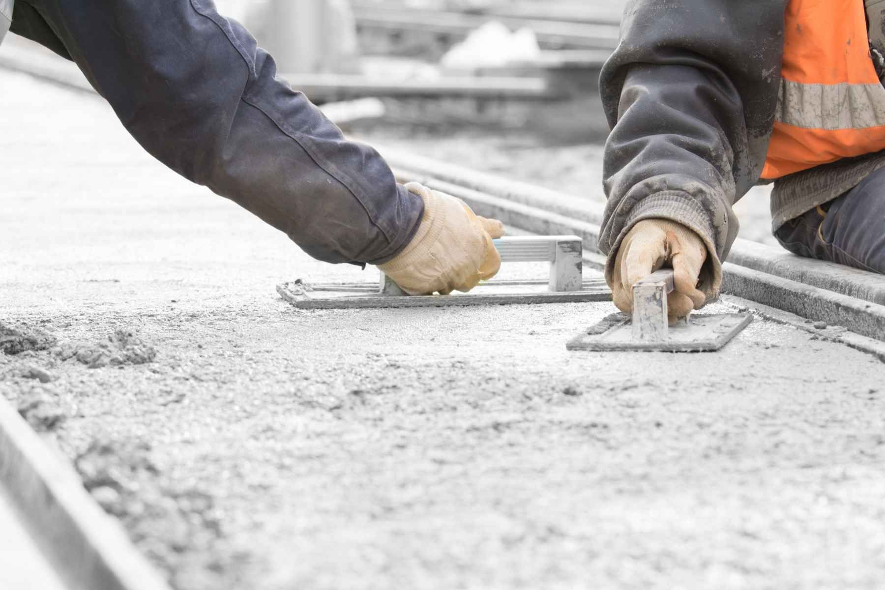 concrete pavement construction workers