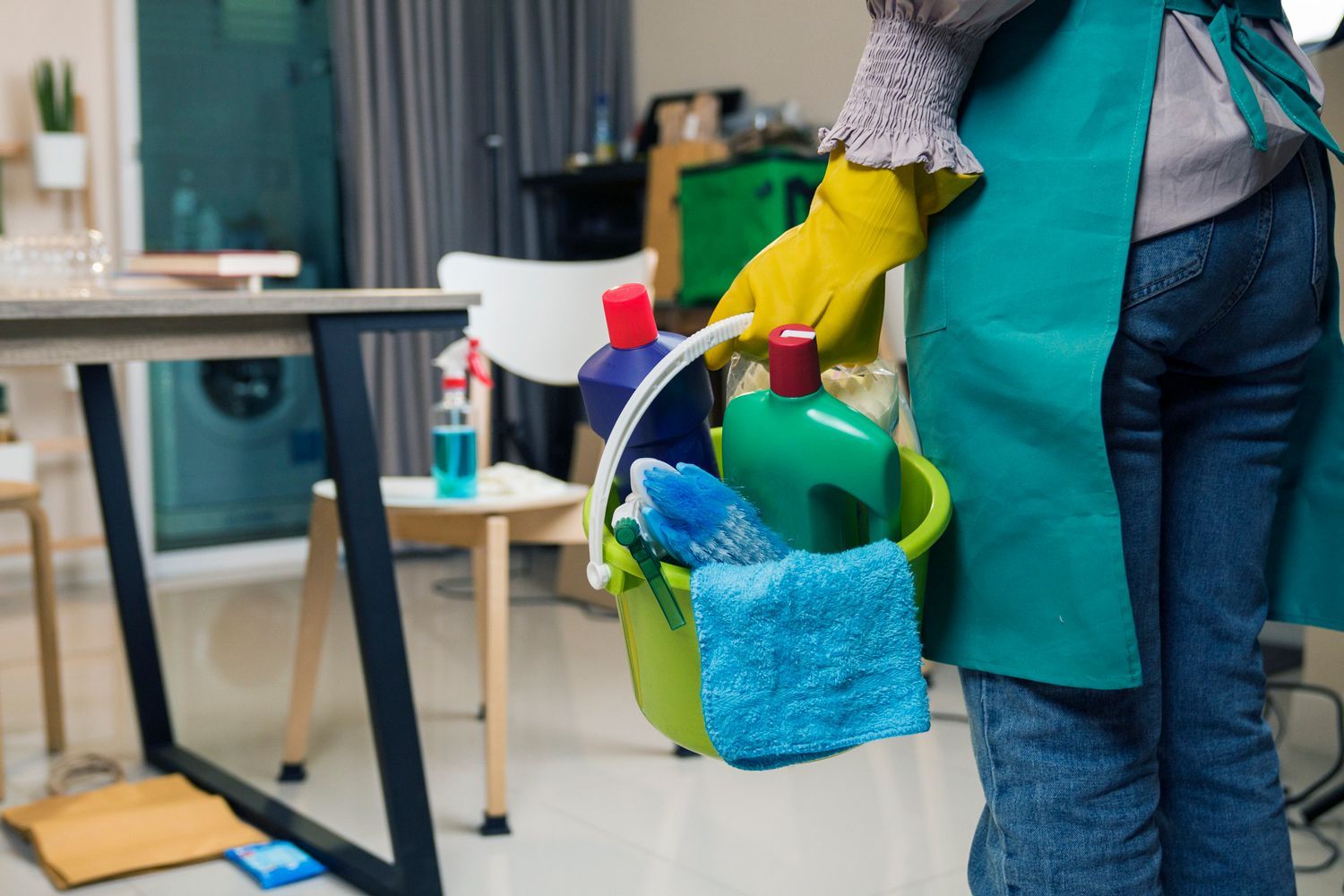 Holding A Bucket With Cleaning Supplies — East Hartford, CT — JJs Cleaning Service LLC