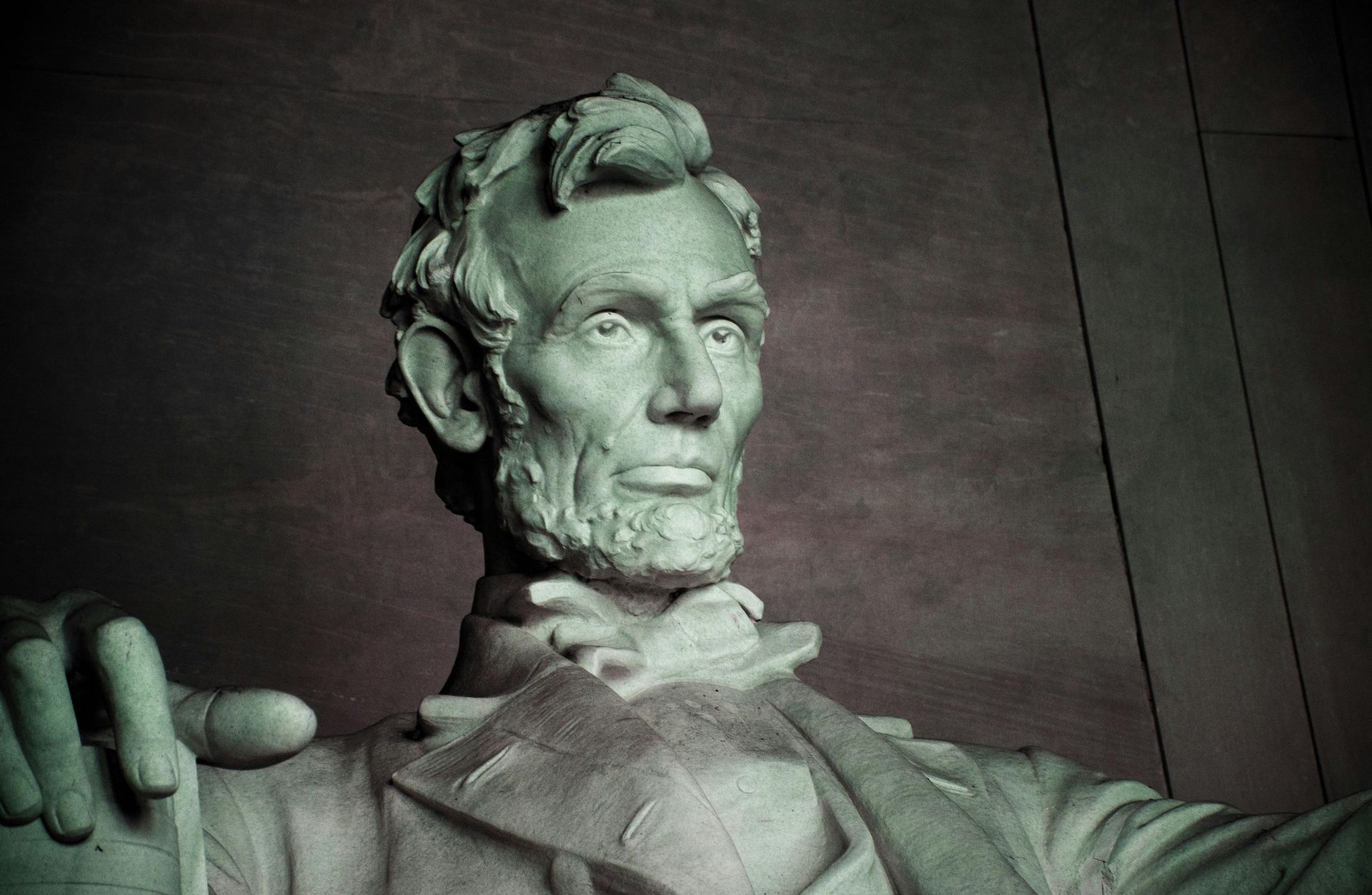A close up of a statue of abraham lincoln
