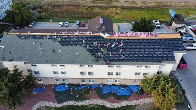 An aerial view of a building that is being remodeled
