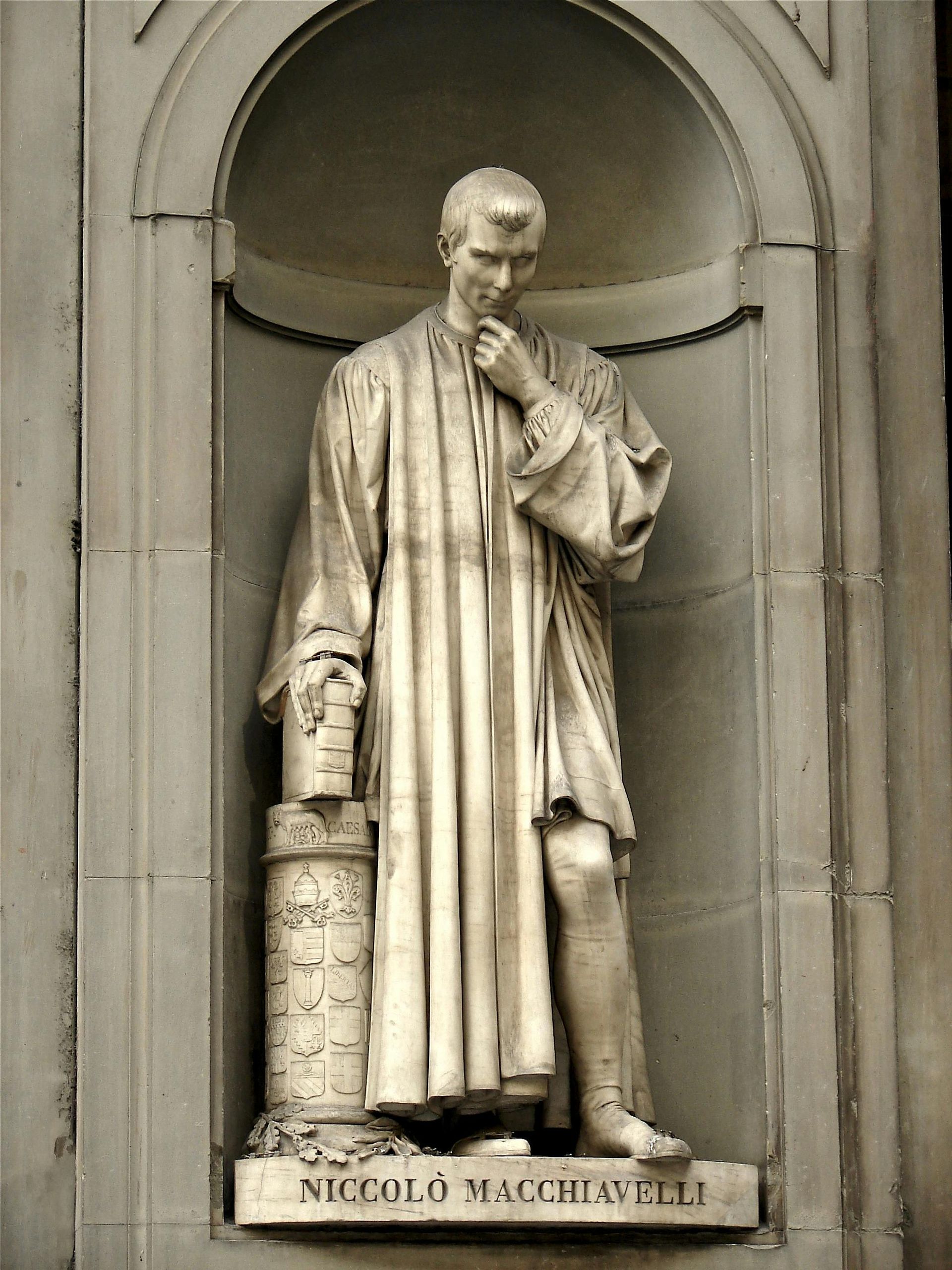 A statue of a man with the name michelo on it