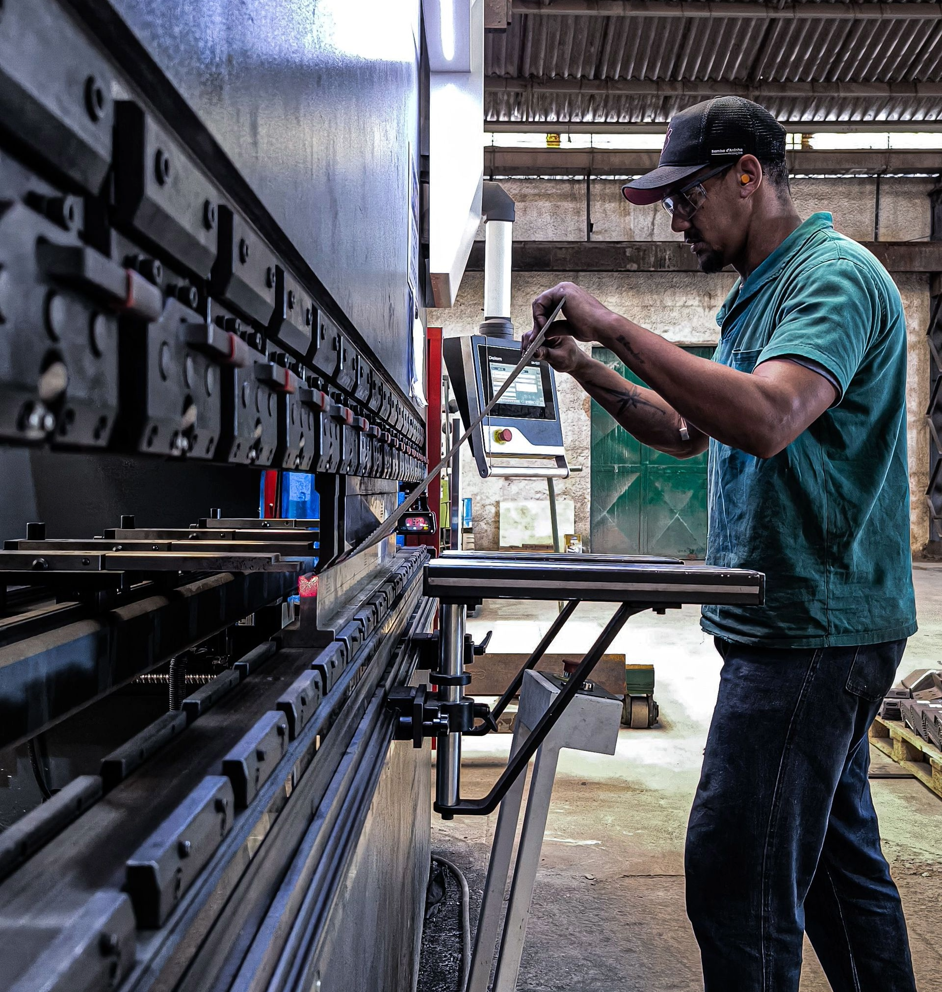 Manufacturing employee working with equipment