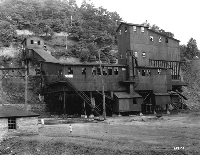 A black and white photo of a very large building