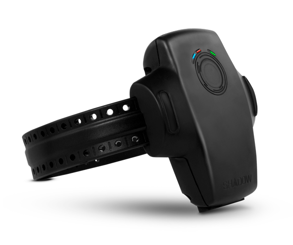 Black electronic ankle monitor with perforated strap, isolated on white background