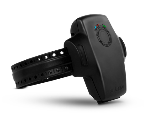 Black electronic ankle monitor with perforated strap on white background