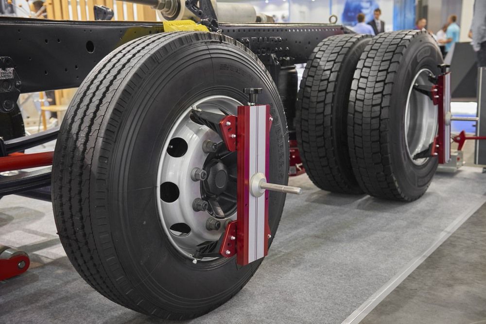 A Close Up of a Truck's Tires on Display at a Convention — Cadillac Transport Repairs in Winnellie, NT