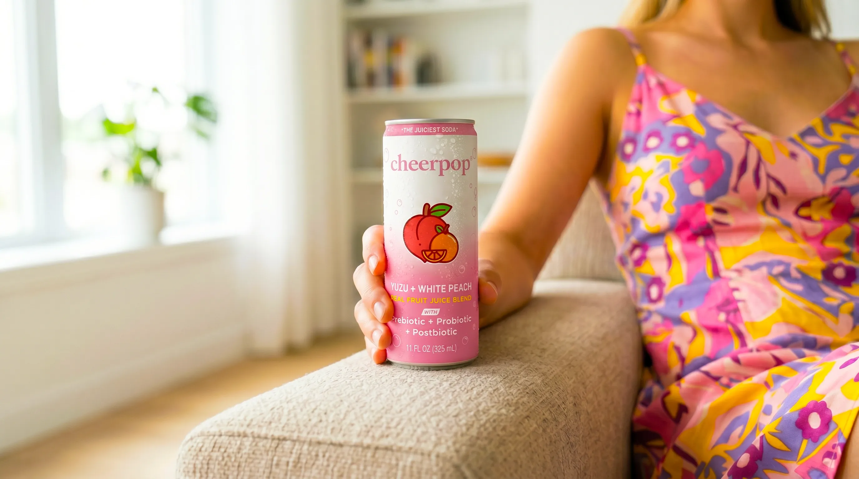 Cheerpop yuzu and white peach can, lounge setting