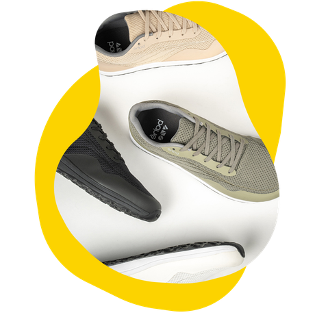 Four pairs of sneakers in different colors, arranged on a white background with a yellow oval.