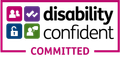 Disability Confident Committed logo with four colored squares and text. The colors are purple, green, and blue.