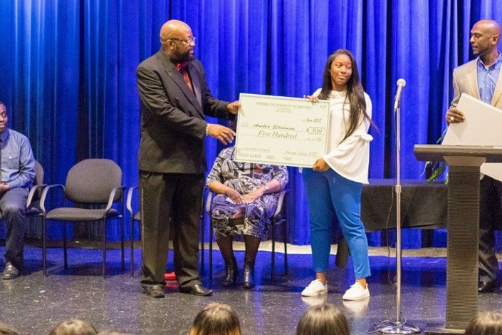 George Love giving the girl certificate