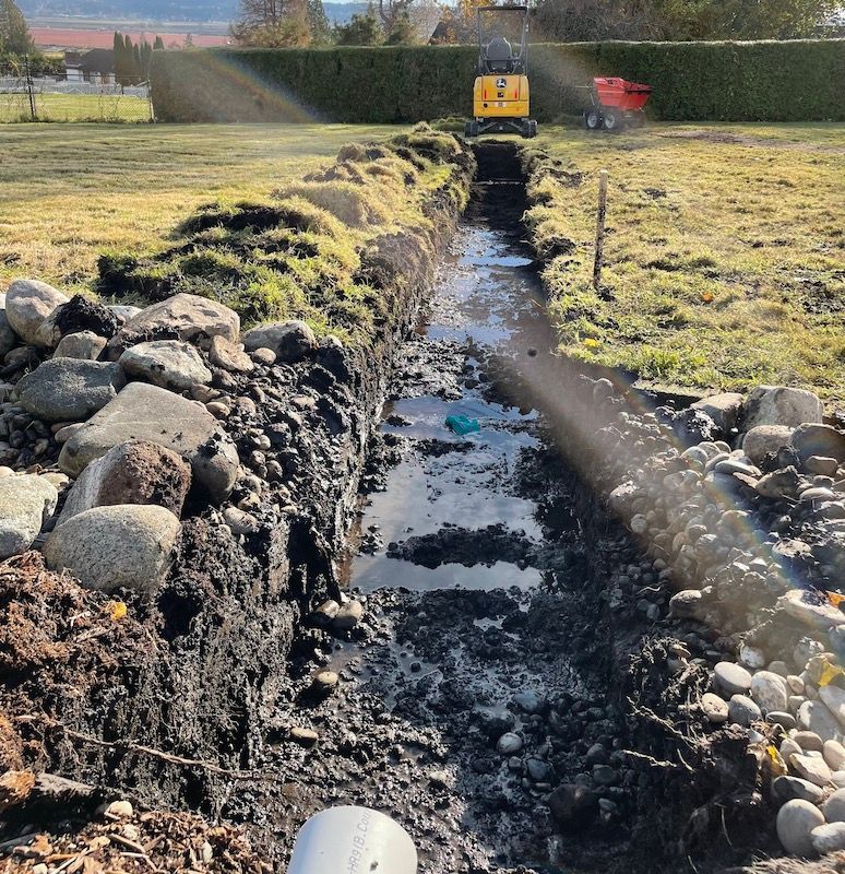 Drainage Installation with open trench and 17 G John Deere Excavator