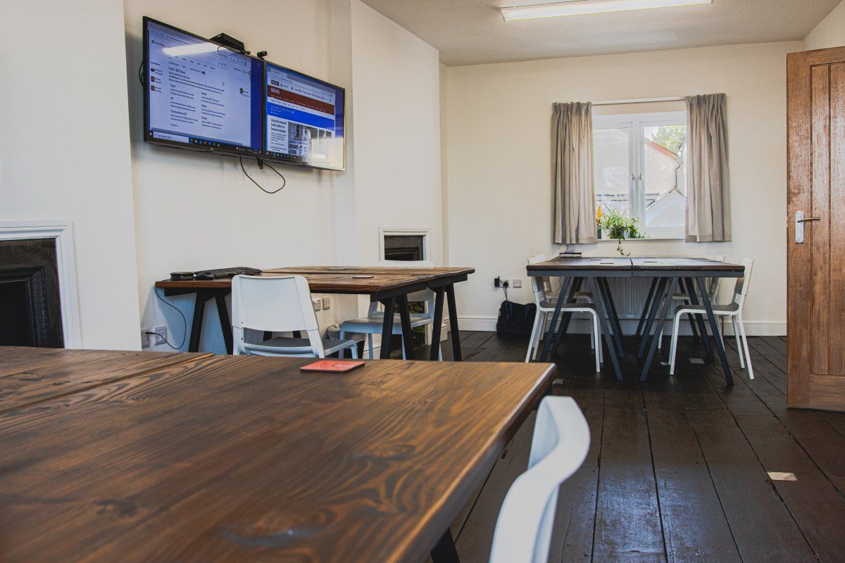 Empty office space with IT screens