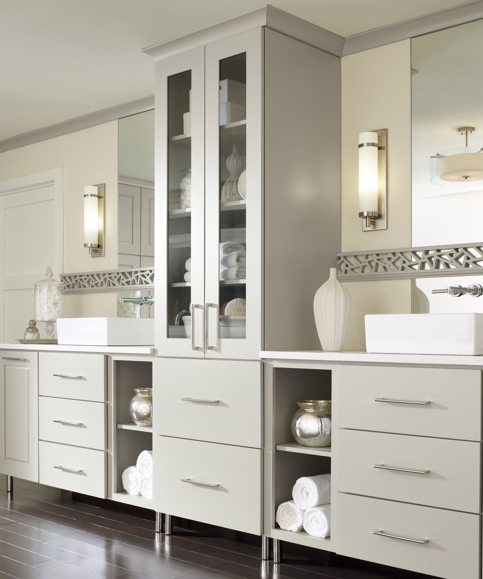 A bathroom with a lot of cabinets and sinks