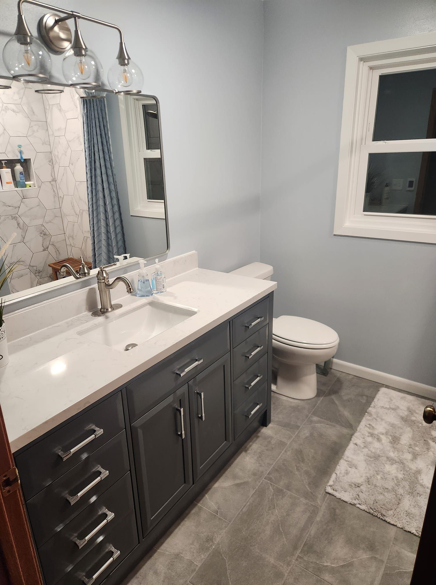 Gray Bathroom Vanity with White Countertop 