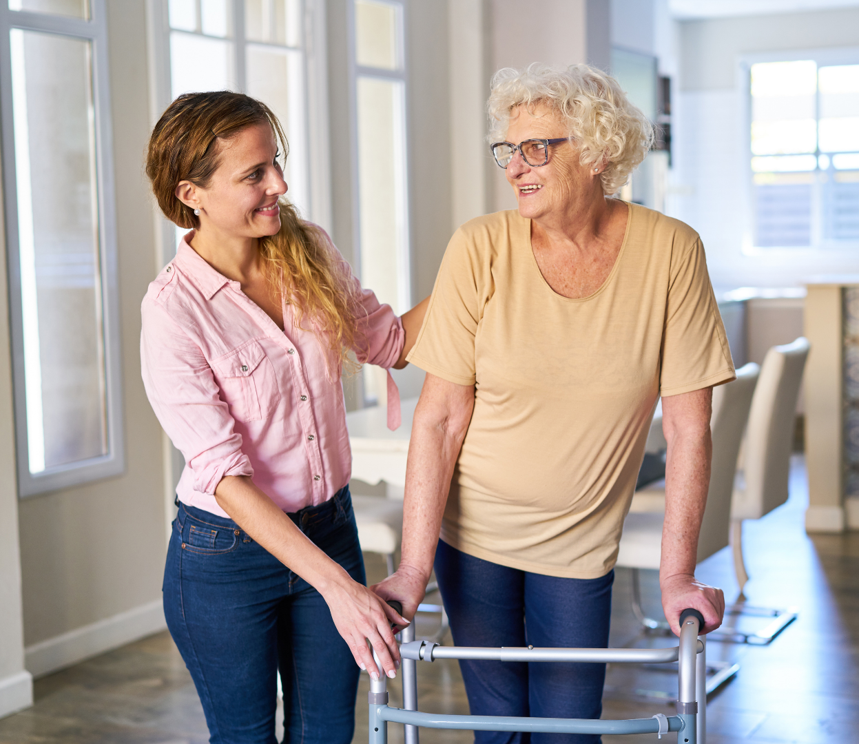 nurse helping elder woman