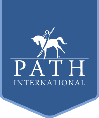 A logo for path international with a man riding a horse