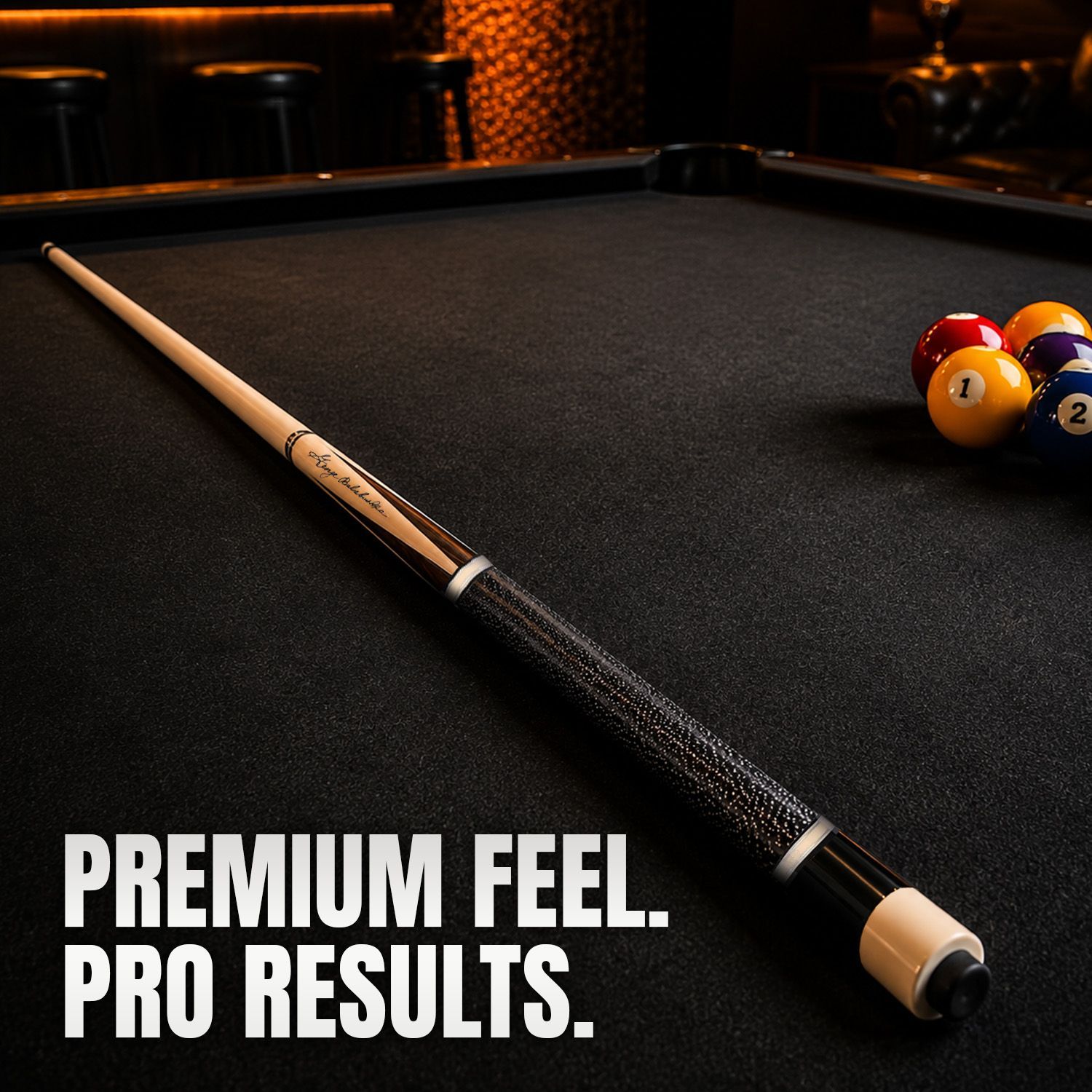 GB26 billiard cue displayed on a professional pool table highlighting the black and maple design, speckled linen wrap, and timeless luxury appearance