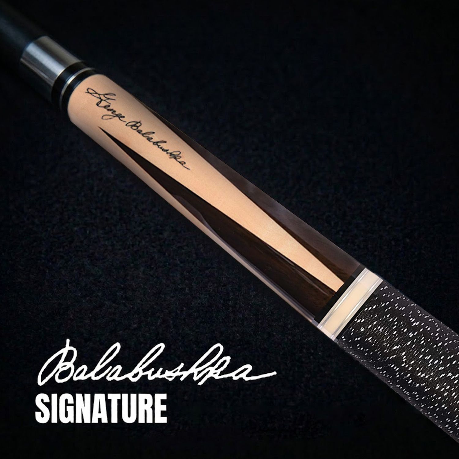 GB26 billiard cue close-up featuring the George Balabushka signature, maple forearm details, rosewood points, black finish, and premium craftsmanship