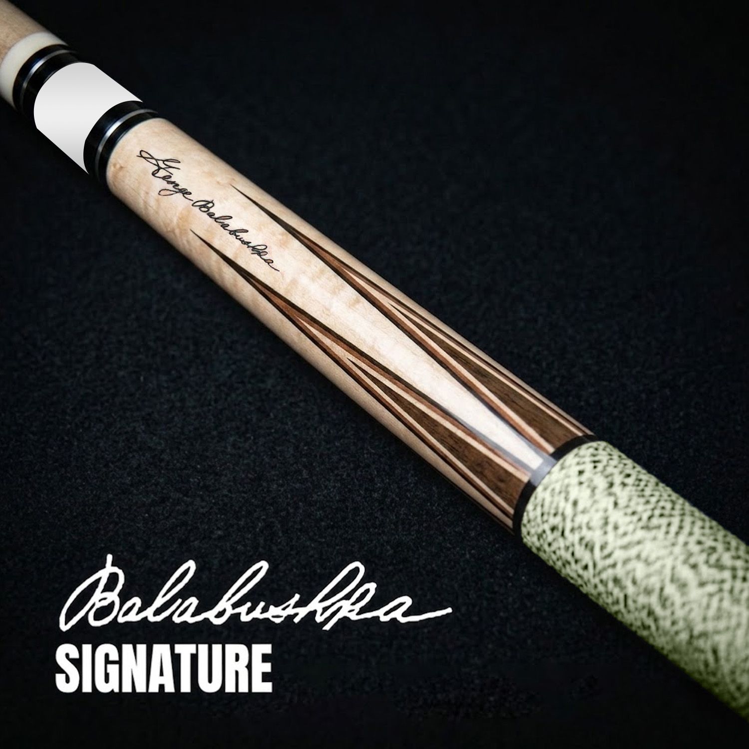GB1 billiard cue close-up showing Balabushka signature engraving and detailed wood craftsmanship