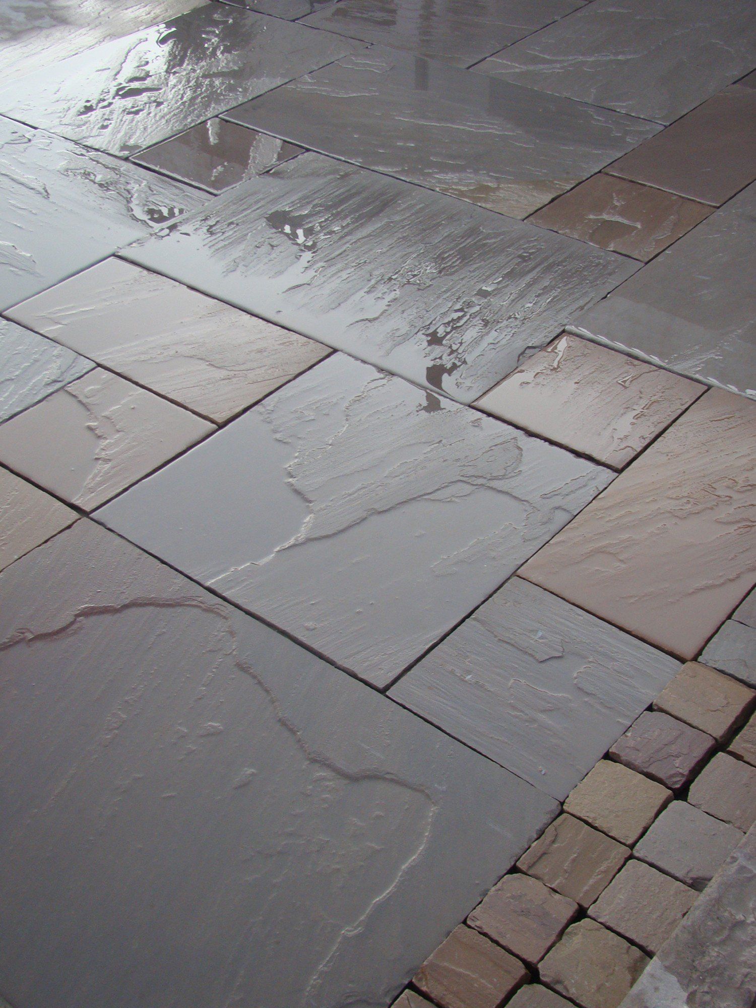 Fencing York Indian sandstone paving in Haxby